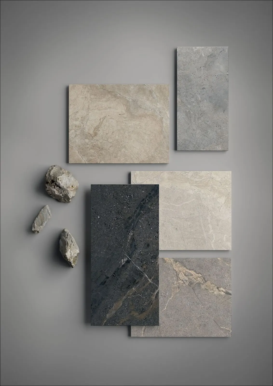 Stone and ceramic tile samples laid out as a set